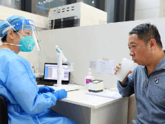 Shanghai residents get 'convenient, sweet' inhaled COVID-19 vaccine booster doses