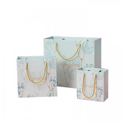 Luxury Custom Logo Garment packaging Cloth Shopping Bag Elegant Jewelry Paper Gift Bag With Rope